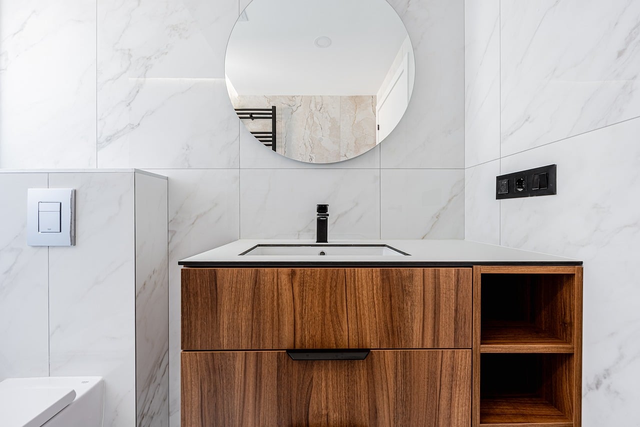 A mirror should be narrower than what sits below it